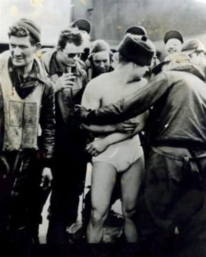 Michael Roskovich, after completed his 25th mission, was stripped to his shorts by his crew. Then they painted a "25" on his back. Michael jumped on a bicycle and rode around the base in his underwear. (credit to Sue Moyer, 306th Bomb Group - First Over Germany Facebook Group)